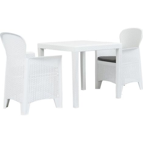 Ensemble table et chaises trois pièces, en plastique blanc avec une finition imitation rotin. (1/5)