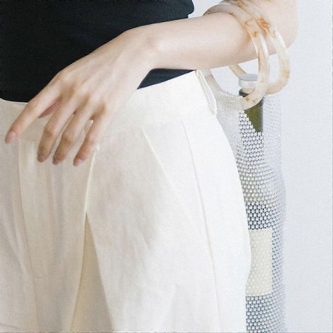 Sac isotherme portable pour bouteille d'eau, sac de rangement brillant tissé à la main (1/5)