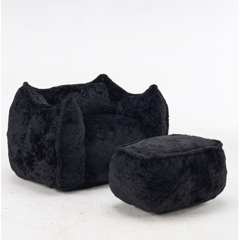 Riesiger Sitzsack-Sessel aus schwarzem Kunstfell mit Kissen und Fußhocker (1/5)