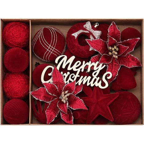 Una caja contiene 38 adornos navideños, aptos para decorar fiestas tanto en interiores como en exteriores. (1/4)
