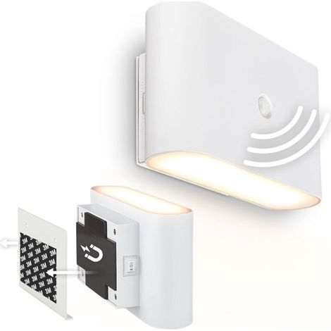 Non necessita di elettricità né di forature. Dotata di sensore di movimento, funzionamento a batteria, supporto magnetico rimovibile e senza fili. Dimensioni: 16 x 9,5 x 6,5 cm. Colore: bianco. (1/4)