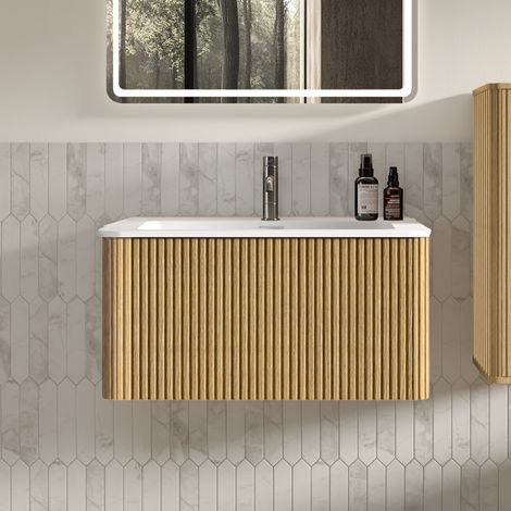 Mueble de baño de 60 cm con cajones de apertura por presión, diseño acanalado y esquinas redondeadas, MDF efecto roble. (1/5)
