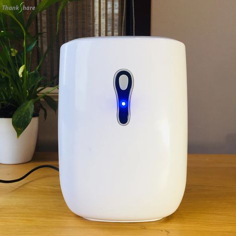 Déshumidificateur domestique avec réservoir d'eau de 600 ml, déshumidificateur et séchoir à air. (1/5)