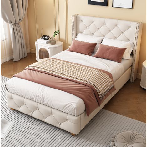 Letto imbottito classico 90x190 cm in lino beige, con testiera capitonné, borchie decorative e rete a doghe (1/5)