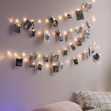 Guirlande lumineuse féérique de 5 m avec 50 LED et 20 pinces à photos, fonctionnant sur piles, idéale pour décorer les murs intérieurs et les fêtes.