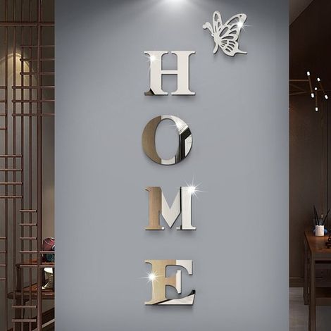 Decoración de pared con efecto espejo 3D "HOME" y mariposa: letras autoadhesivas para un interior moderno y con ambiente.