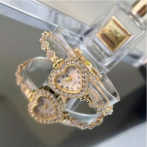 1pc Bracelet en alliage couleur doré pour femme, boîtier de montre en forme de cœur, cadran à chiffres arabes, sangle ajustable à cordon. Décoration quotidienne, cadeau de fête. (1/4)