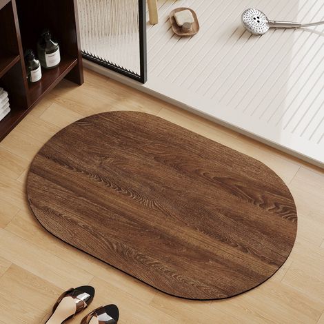 Tapis de bain ovale en terre de diatomées, 50×80 cm, antidérapant et absorbant pour les portes de salle de bain.