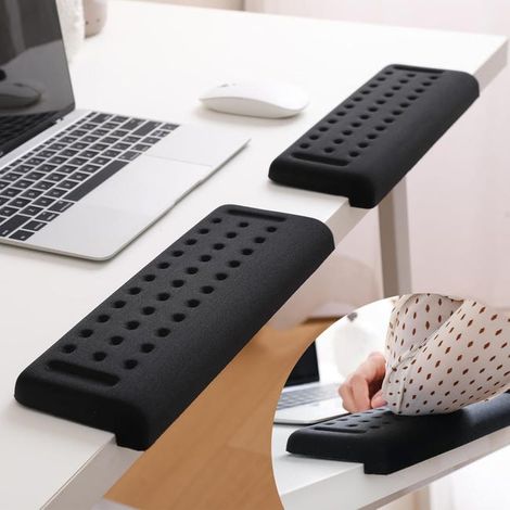 Un juego de dos soportes de borde de mesa en forma de L, que proporcionan un apoyo cómodo para los bordes de la mesa y evitan que se deslice. (1/5)