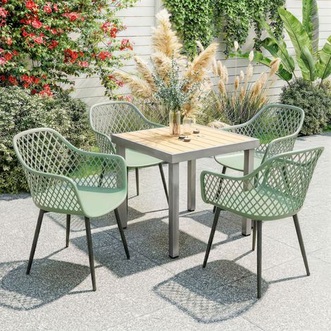 Ensemble de 4 chaises de jardin vertes, avec dossier en losange et accoudoirs. (1/5)