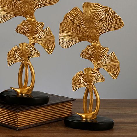Decoración de mesa moderna de tres hojas, fabricada en resina con base antideslizante y resistente al desgaste. (1/5)