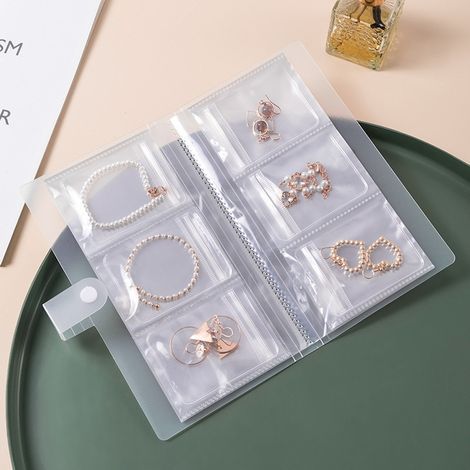 1 Aum Schmuckorganizer aus mattiertem, transparentem Kunststoff – 84 antioxidative und staubdichte Beutel für Ringe, Ohrringe, Halsketten, Kosmetikartikel – Aufbewahrung, Geschenkidee (1/5)