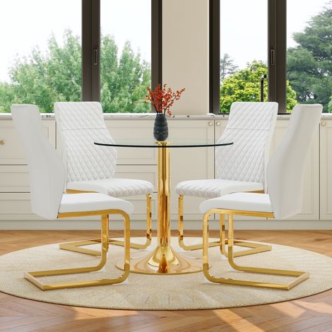 Table de salle à manger ronde verre 85 cm, pieds dorés métalliques, design luxe moderne, accompagnée de 4 chaises blanches et dorées élégantes.