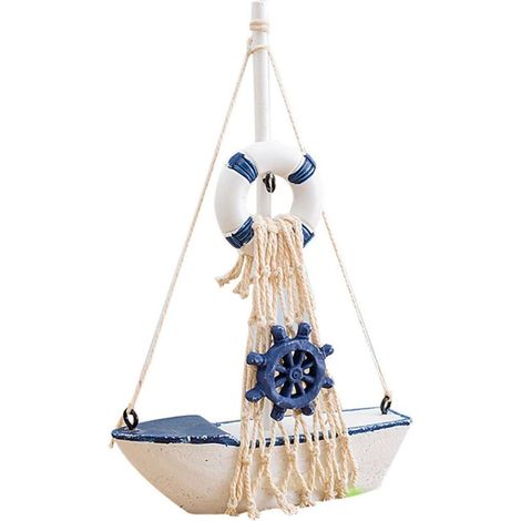 Statues et autres décorations. Maquette de petit voilier naviguant paisiblement. Bateau en filet de coton, décoration intérieure. Objet artisanal en bois. 17 x 12 x 3 cm. 1 pièce, bleu et blanc.