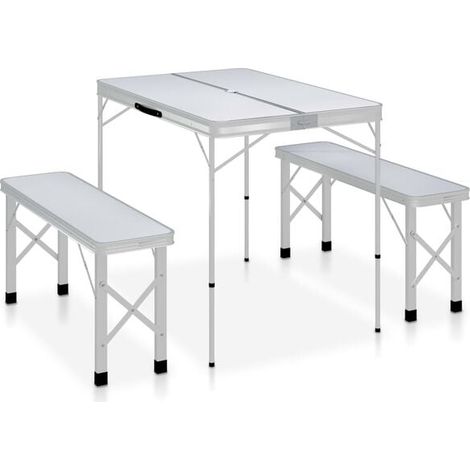 Ensemble table et chaises de camping pliantes, comprenant deux bancs, en aluminium blanc.