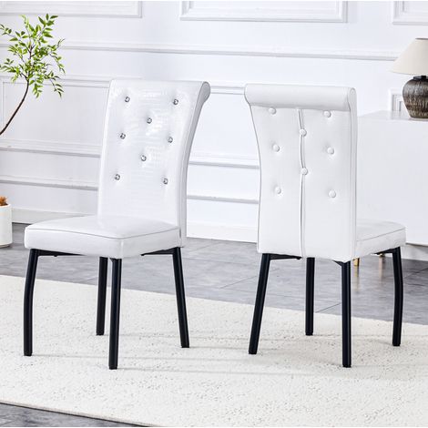 Set de 2 sillas de comedor tapizadas en PVC con patas de metal blancas y negras (1/5)