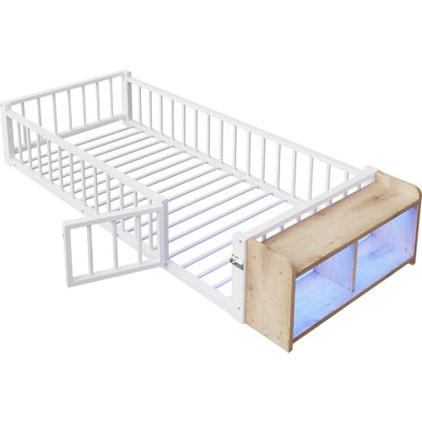 Cama infantil de metal 90 x 200 cm con barandilla, almacenaje abierto y LED, blanco HOMVRA (1/5)