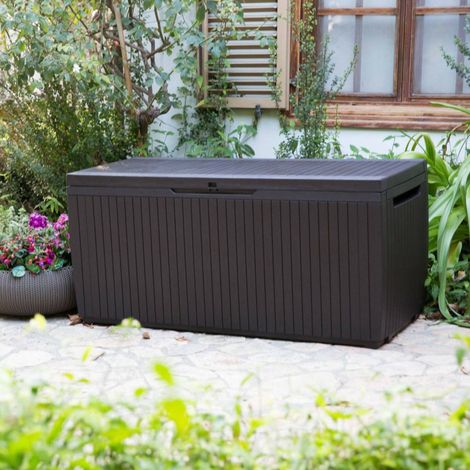 Dmora - Baúl de almacenamiento exterior Burlington, Cofre de jardín, Banco con almacenaje, Arcón para exteriores, 123x54 h57 cm, Marrón (1/5)