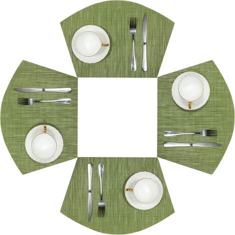 Set mit 4 runden, grünen, keilförmigen Platzsets, hitzebeständig und leicht zu reinigen. (1/5)