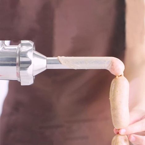 Ein metallener Zerkleinerungsaufsatz (wie abgebildet) zur Verwendung als zusätzlicher vertikaler Küchenmixer.