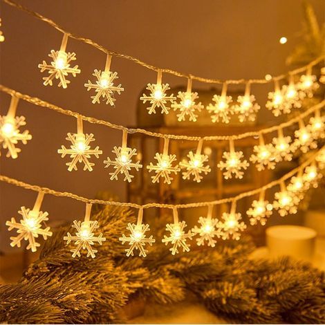 set (3 metri, 20 LED) di luci a stringa a LED a forma di fiocco di neve, alimentate a batteria, per decorazioni natalizie interne ed esterne. (1/5)