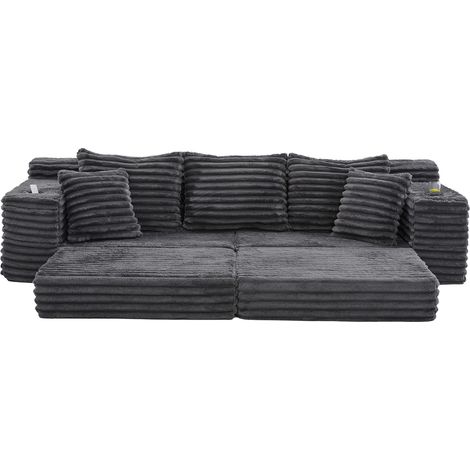 Sofá cama de pana gris oscuro con respaldo alto, cojines, bolsillos laterales y portavasos (1/5)