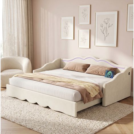 Lit gigogne capitonné REDOM 90x200cm, extensible jusqu'à 180cm, avec éclairage LED, port USB et revêtement en velours beige (1/5)