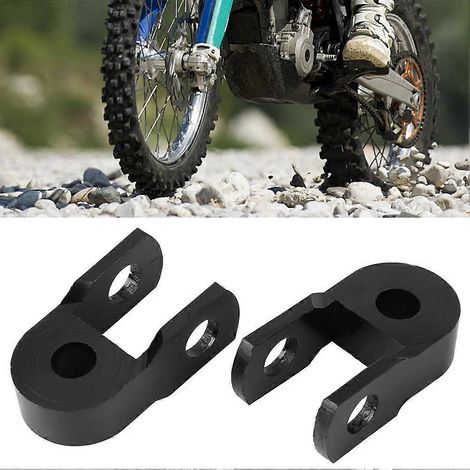 Dispositif universel de rehaussement d'amortisseur pour moto, compatible avec le châssis n° 1