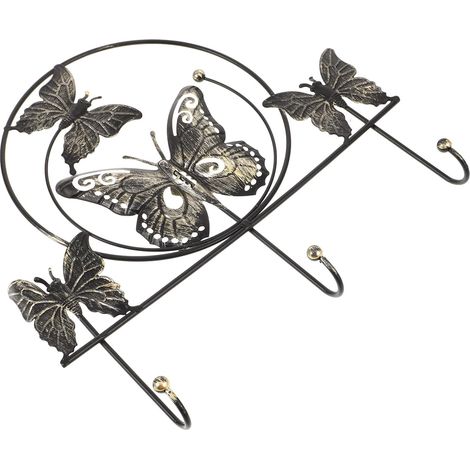 murale en fer noir en forme de papillon avec 3 crochets sans