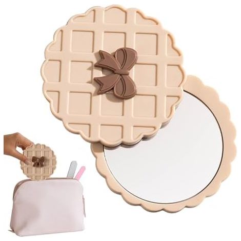Miroir de poche rond à motif gaufré Genérico, idéal pour les retouches beauté, les selfies shopping, le coiffage et les trajets quotidiens. Accessoire beauté indispensable en voyage. (1/5)