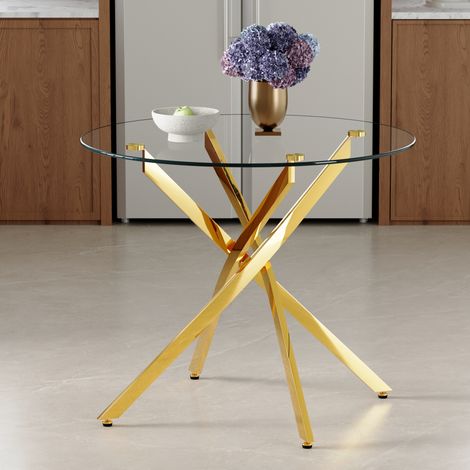 Table à manger ronde 88 cm en verre trempé base métallique dorée. Design luxueux léger pour 2 à 4 personnes et petit espace repas. (1/5)