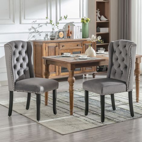 Lot de 6 fauteuils de salle à manger en velours gris, piètement chêne, clous chromés et garniture cloutée, pour chambre, cuisine, salon et détente.