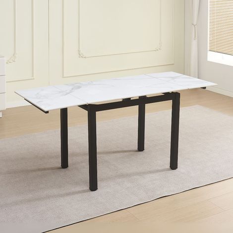 Tavolo allungabile Kyoto con piano in ceramica marmo bianco e struttura in metallo nero 100x70x75H