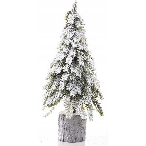 Árbol de Navidad pequeño, mini, artificial, cubierto de nieve sobre un tronco. (1/5)