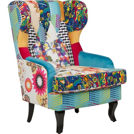 Sillón orejero tapizado en tela multicolor retazos acolchado con botones patas de madera azul Molde