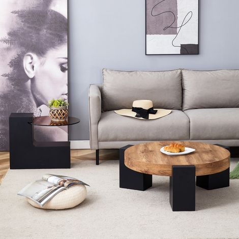 Table basse ronde double couche,plateau verre marron et pieds MDF noirs en L. Démontable,elle optimise l’espace dans le salon. (1/5)