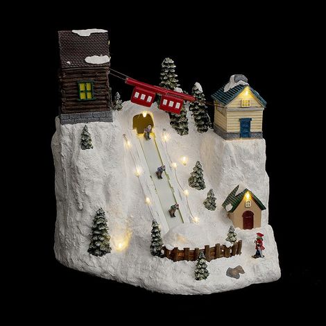 Fééric Lights And Christmas – Village de Noël lumineux et animé – Scène de cours de ski avec 18 LED blanc chaud – Dimensions 32,5 x 29 x 33,5 cm – Poids 3,2 kg (1/2)