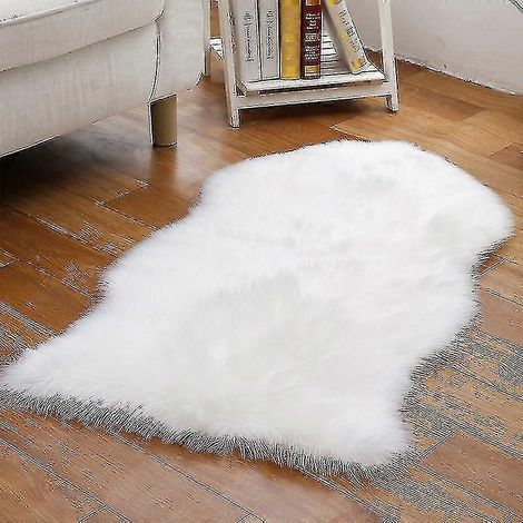 Tapis en fausse fourrure douce, moelleuse et antidérapante, fabriqué en peau de mouton, également adapté comme housse de chaise ou coussin de siège (taille, couleur : 40 x 60 cm – blanc). (1/4)