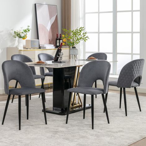 Ensemble de 6 chaises de salle à manger design, capitonnées et dotées d'un dossier, d'une assise en velours, d'une structure en métal et de pieds réglables. Motif losanges au dossier, coloris gris. (1/5)