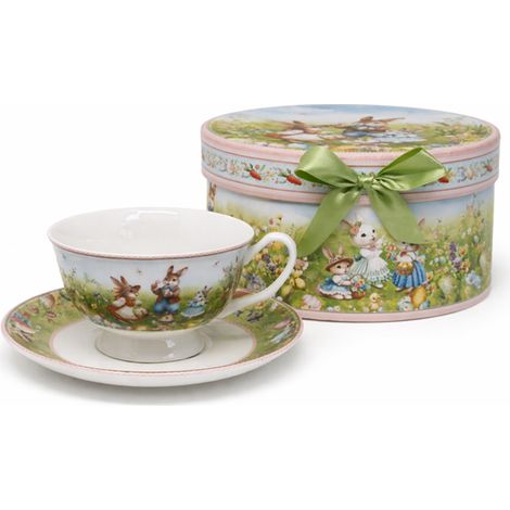 Caja de regalo con taza y platillo de porcelana con diseño de conejitos de Pascua. (1/5)