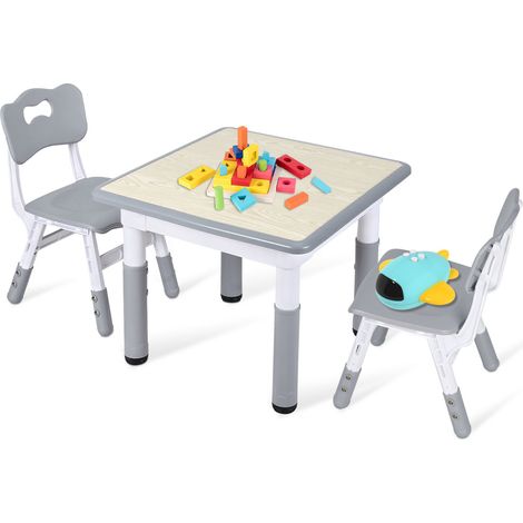 Wolketon Mesa infantil con 2 sillas regulables en altura 60 x 60 cm, tablero lavable multifunción para jugar y estudiar (1/5)