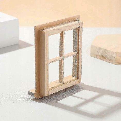 Fenêtre ordinaire 2025 à quatre carreaux. Petite fenêtre en bois.