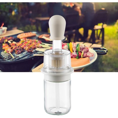 Bouteille distributrice d'huile 2 en 1 résistante à la chaleur, portable et économique, avec brosse en silicone souple pour crêpes et barbecue (blanc). (1/5)