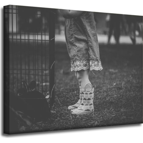 Leinwanddruck: Schwarze und weiße Gummistiefel, 50 x 40 cm