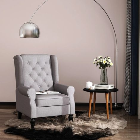 Fauteuil en polyester gris 74x86x102 cm, dossier haut et capitonnage, pieds en bois noirs (1/5)