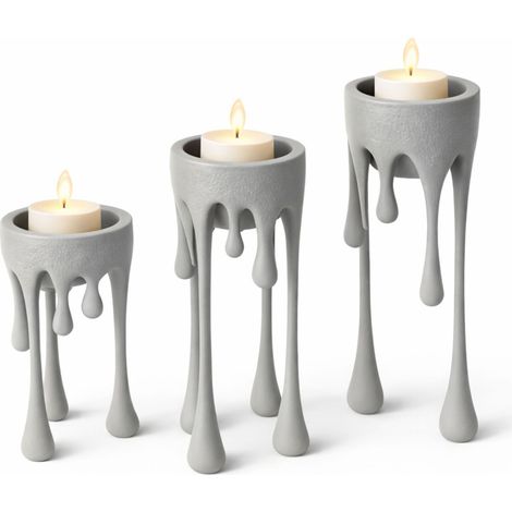 Un candelabro moderno con forma de "cera fluida" en color gris. (1/3)