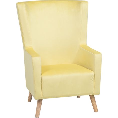 Sillón orejero tapizado en terciopelo amarillo respaldo alto patas de madera Oneida