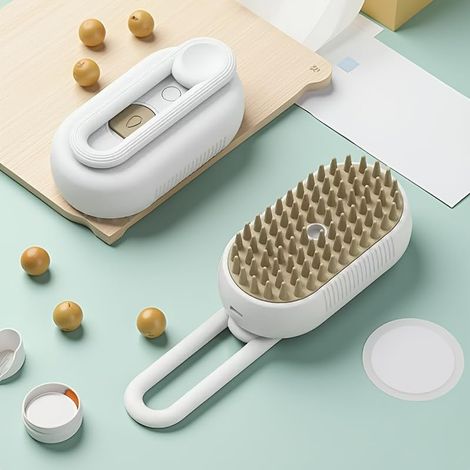 Brosse à poils d'animaux et masseur avec nettoyage à la vapeur – Peigne de toilettage à double usage pour chat et chien, poignée, poils et base en caoutchouc, fonctionnement à basse tension 19.56.5cm (1/3)