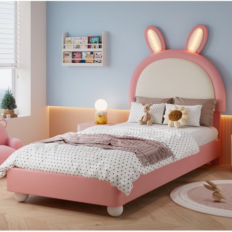 Cama infantil tapizada en piel sintética rosa y blanca, 90x200 cm, con cabecero de conejo, iluminación LED y somier de láminas incluido. (1/5)
