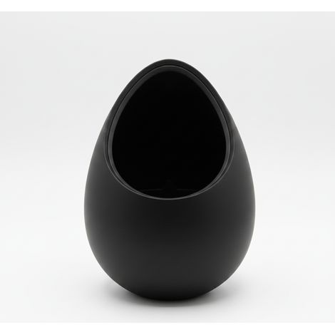 Un moderno vaso decorativo nero a forma di nido per piante.